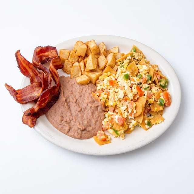 Migas [Eggs with Tortilla Strips] Breakfast.